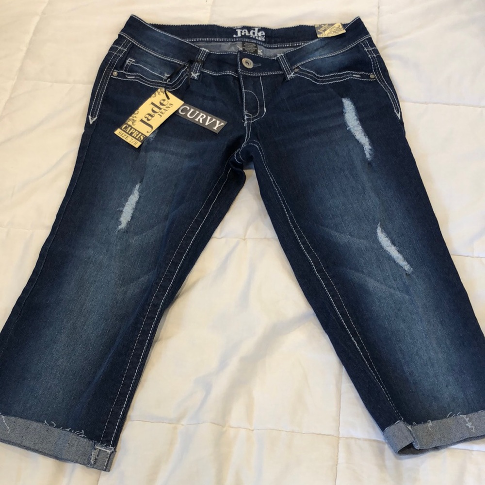 Brand new (with tags) Capri style dark wash denim jeans.
